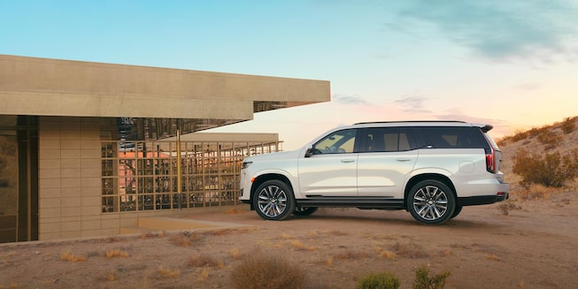 Side exterior of a parked 2021 Cadillac Escalade.