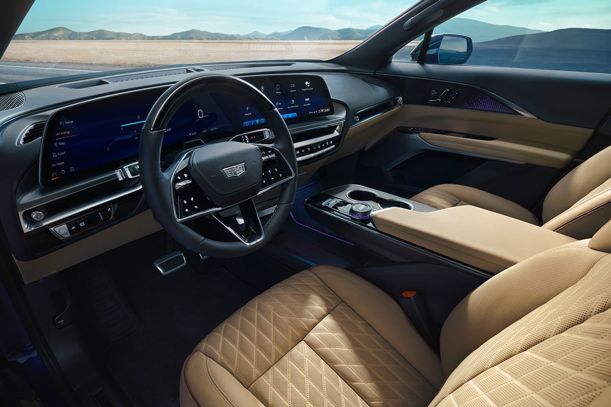Driver's view of the sophisticated front interiors of the 2025 Cadillac LYRIQ.