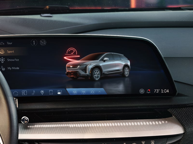 Les options de mode de conduite affichées sur l’écran du système d’infodivertissement du VUS électrique Cadillac OPTIQ 2025.