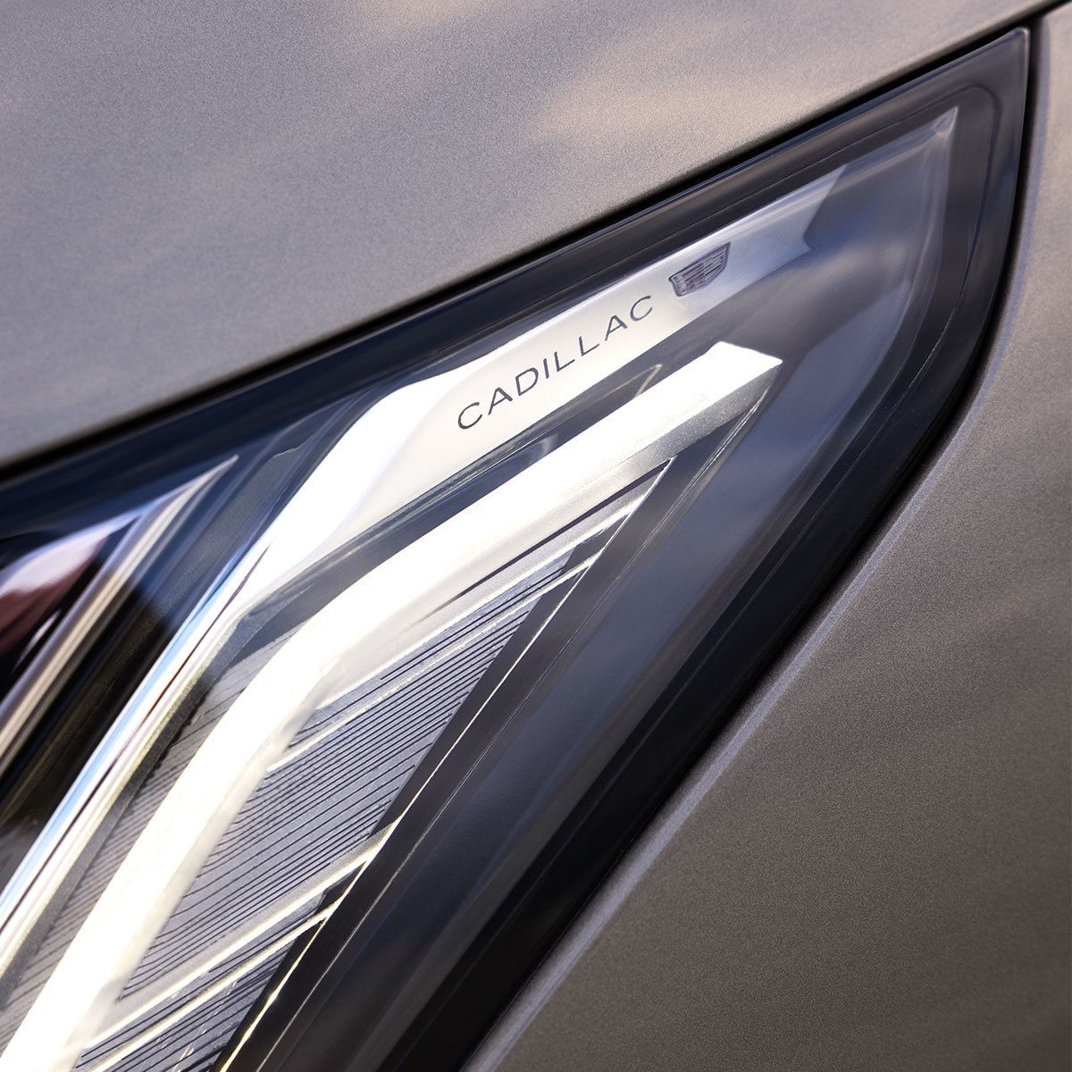 Close up view of the headlamp on the 2025 Cadillac OPTIQ electric SUV.
