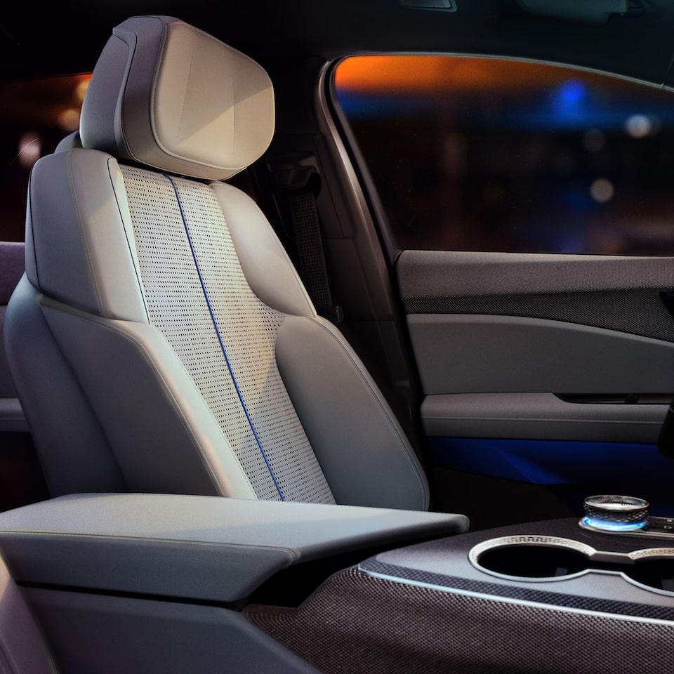 Comfortable front row seating on the 2025 Cadillac OPTIQ electric SUV.