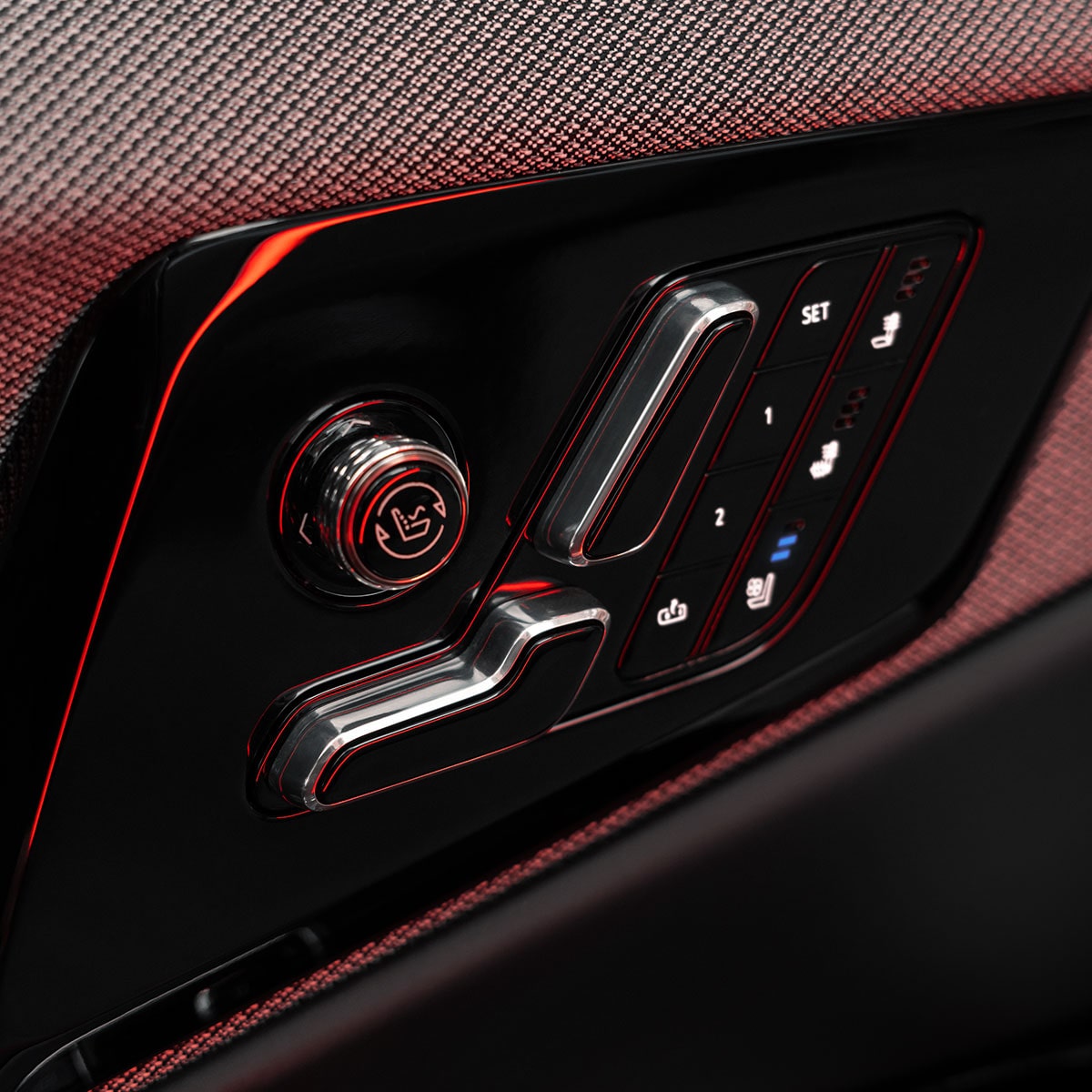 Close up view on the seat controls on the 2025 Cadillac OPTIQ electric SUV.