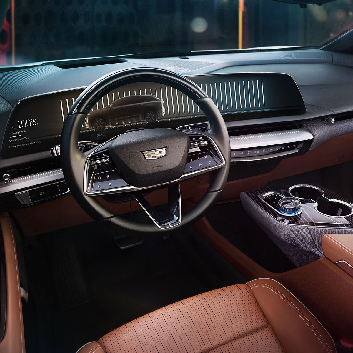 Driver's view of the steering wheel on the 2025 Cadillac OPTIQ electric SUV.