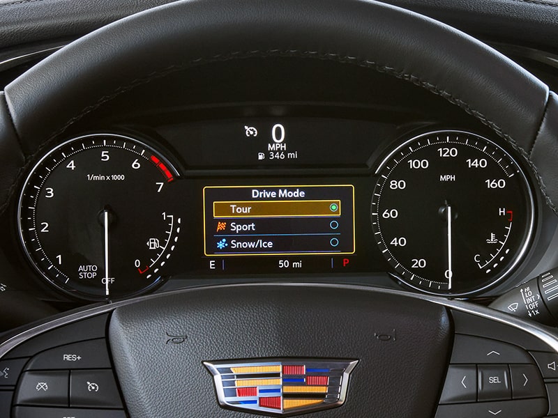 Close up view of the Driver Mode Selector on the 2025 Cadillac XT5 luxury SUV.