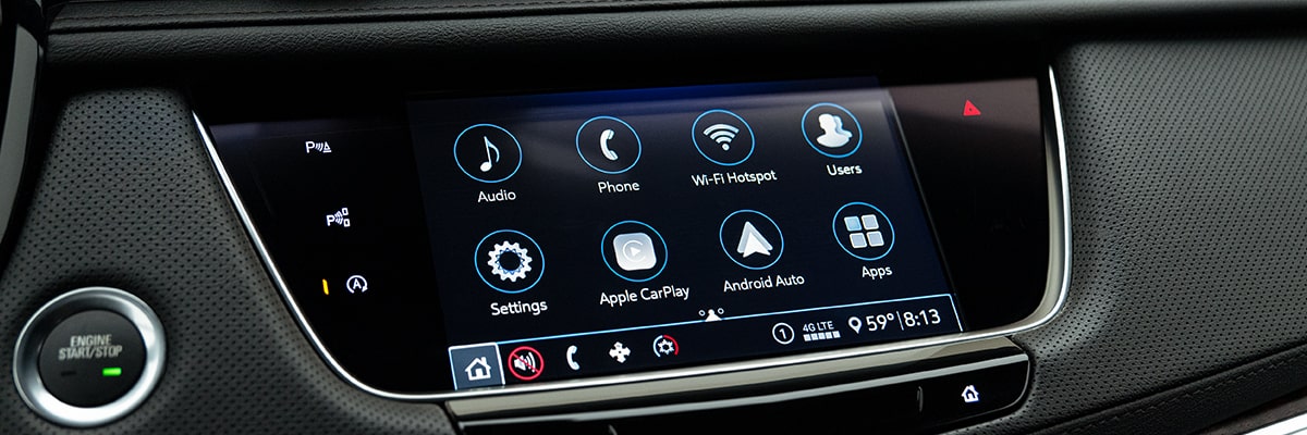 Plusieurs applis affichées sur l’écran du système d’infodivertissement du VUS de luxe Cadillac XT5 2025.
