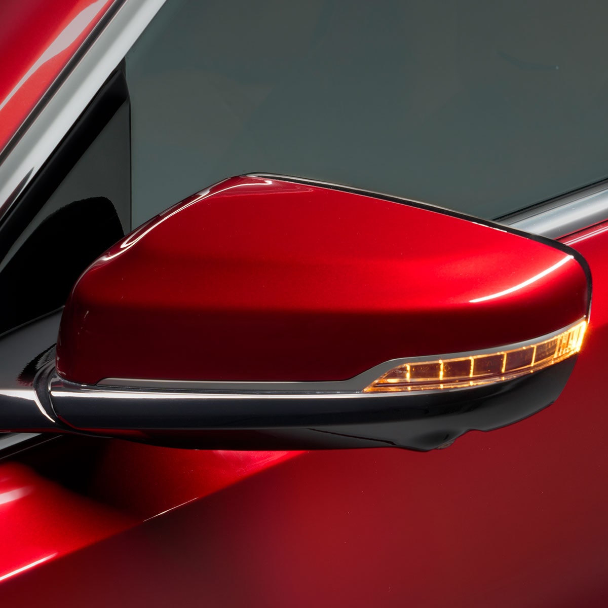 Close-up view of the side mirror on the 2025 Cadillac CT5.