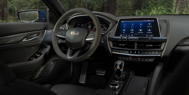 2021 Cadillac CT5 interior featuring the steering wheel and infotainment system.