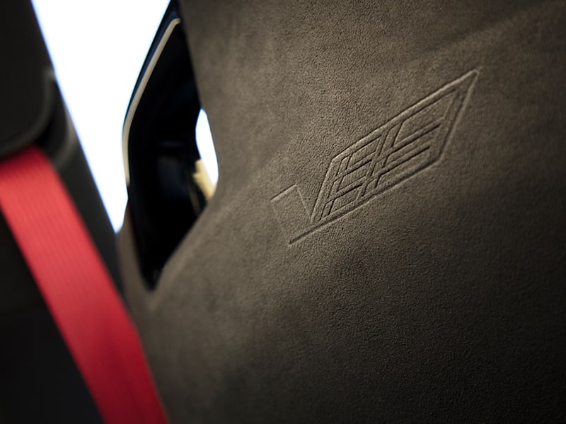 Sueded microfiber accents on the interiors of the 2025 Cadillac CT4-V luxury sports sedan.