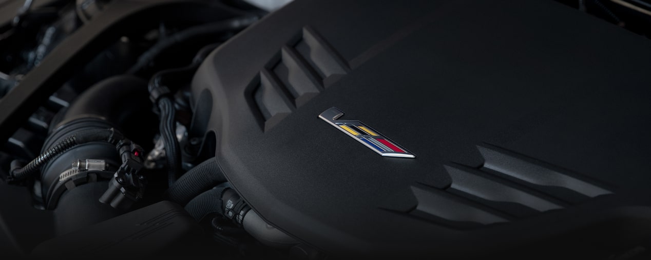 Close up view of the 2.7L dual-volute turbocharged engine on the 2025 Cadillac CT4-V luxury sports sedan.