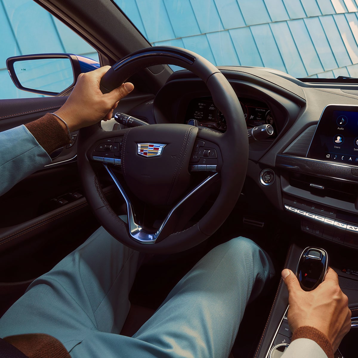 A perso driving the 2025 Cadillac CT4-V luxury sports sedan.