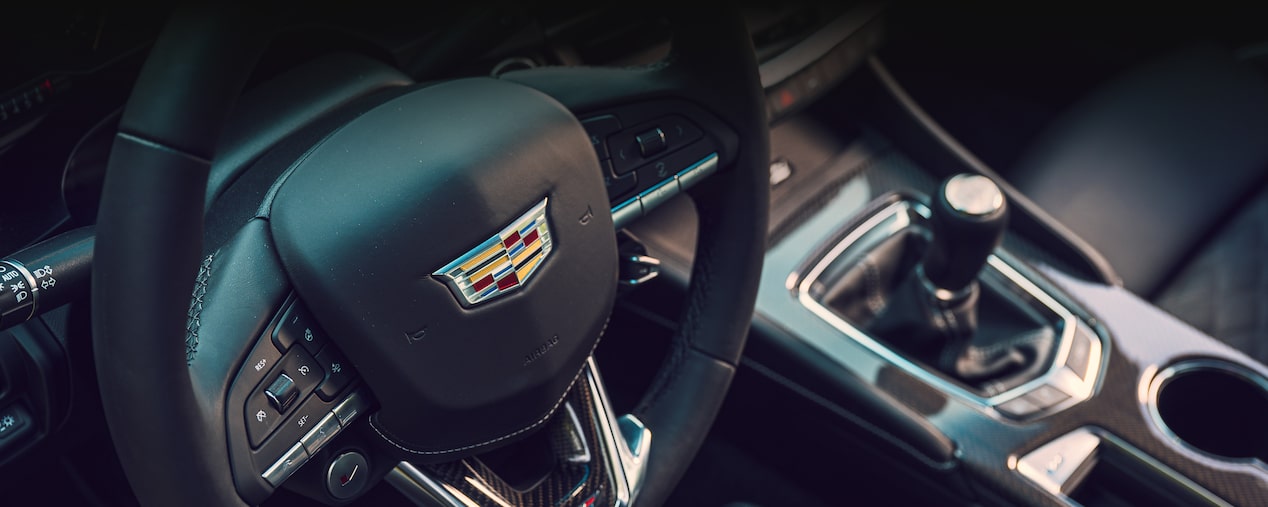 Top view of the steering wheel on the 2025 Cadillac CT4-V luxury sports sedan.