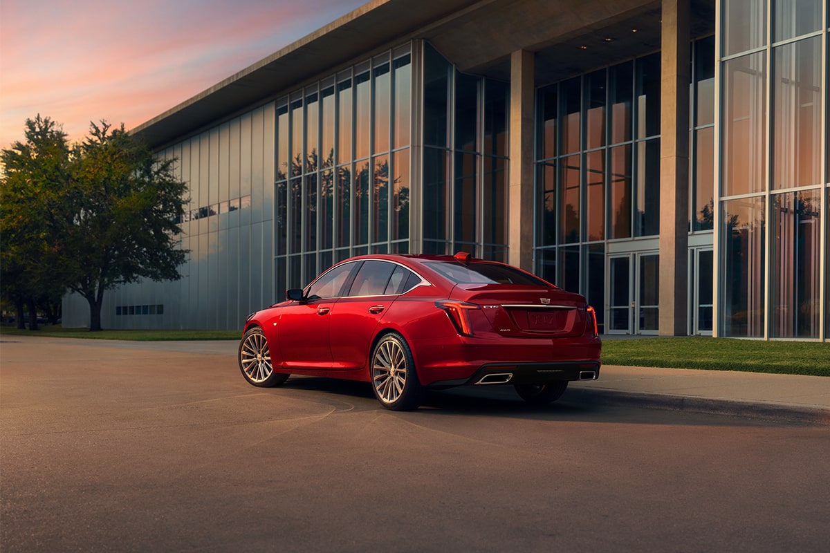 The 2026 Cadillac CT5 parked beside a building.