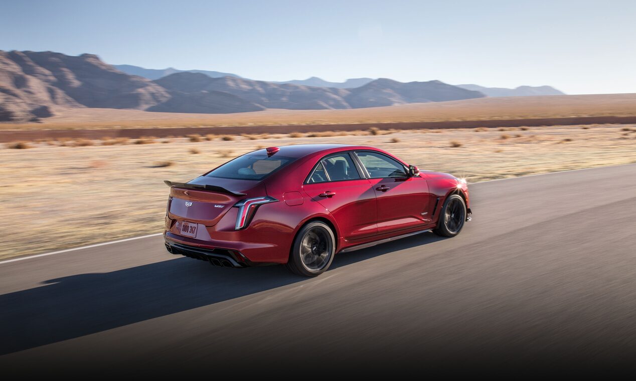 2023 Cadillac CT4-V driving on the open road.