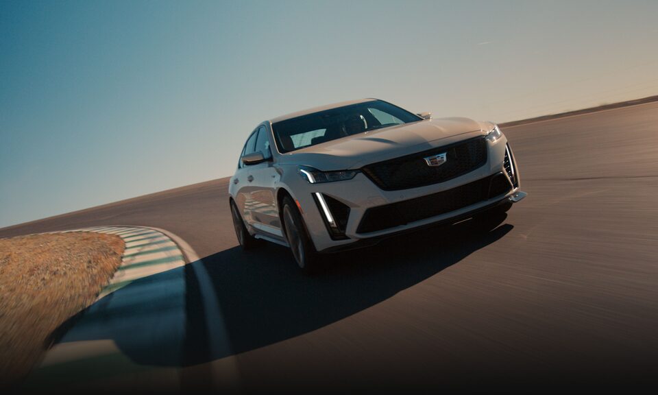 Front view of the 2023 Cadillac CT5-V driving on the track.