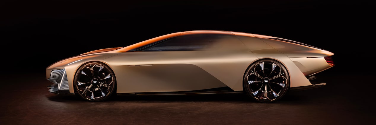 Side view of a Cadillac Opulent Velocity parked in a dim area.
