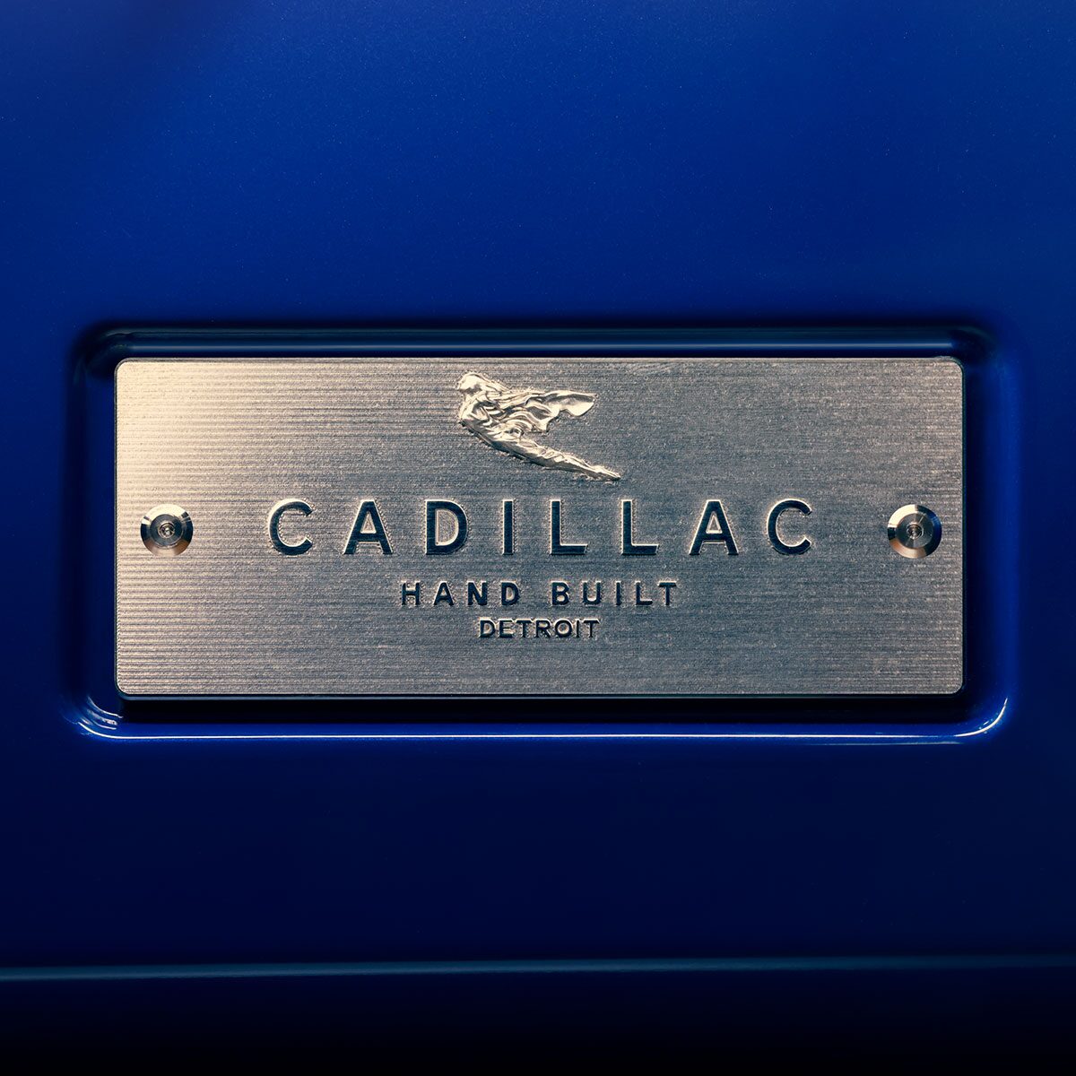 Cadillac Goddess insignia on the metal plate denoting the hand-built nature of the 2023 Cadillac CELESTIQ.