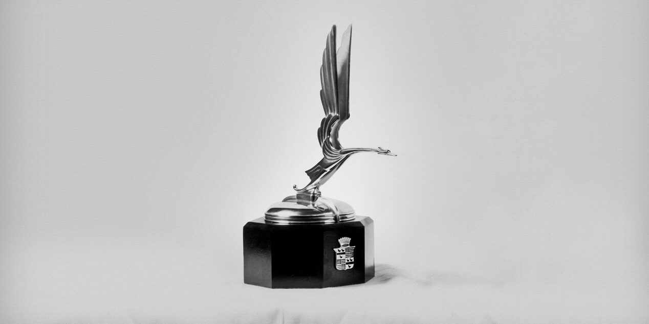 The Cadillac Goddess icon from the 1930s in the form of a graceful heron.