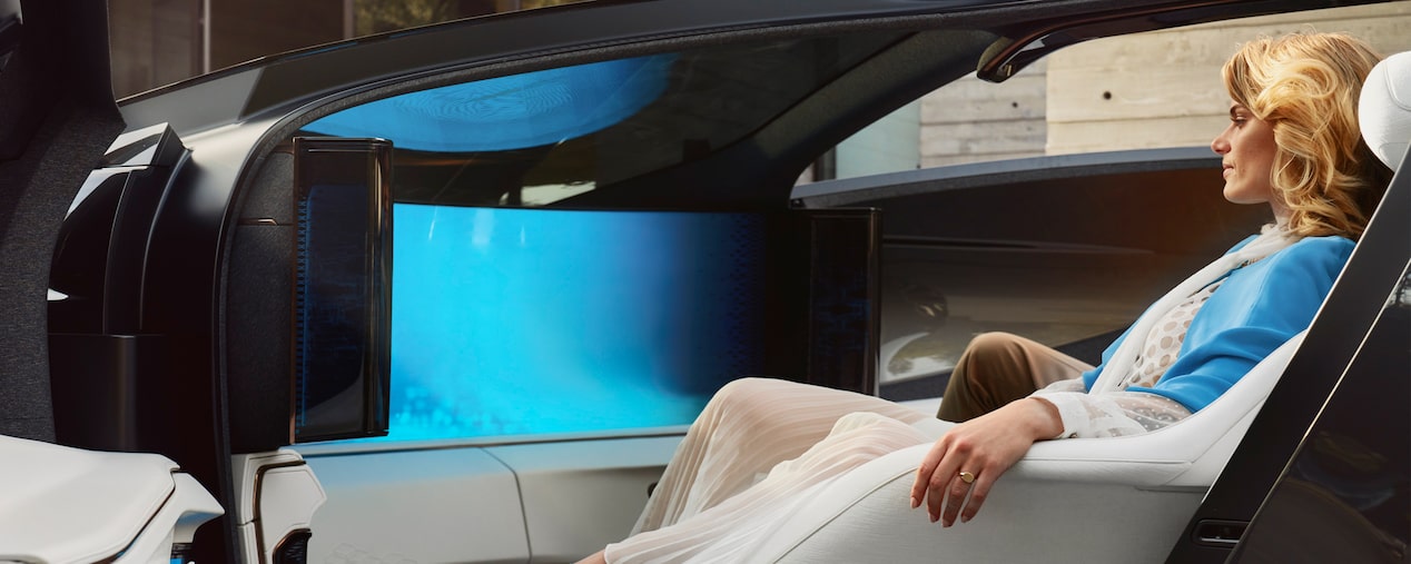 A person seated comfortably inside a Cadillac InnerSpace Concept Vehicle.