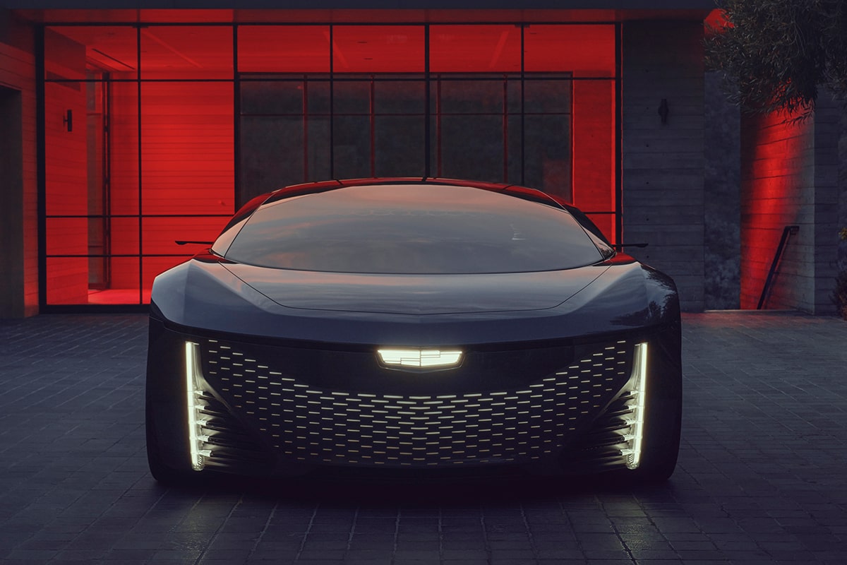 Front view of a Cadillac InnerSpace Concept Vehicle stationed inside a dimly lit building.