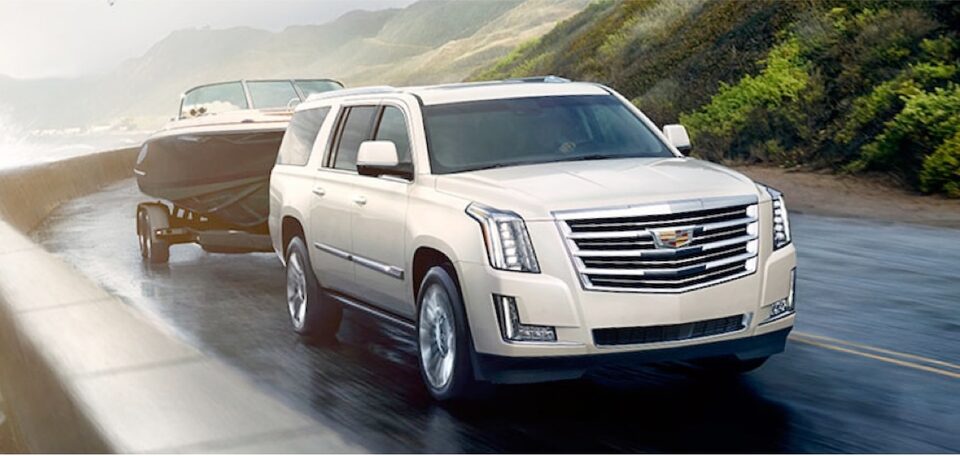 2020 Cadillac Escalade Full-Size SUV Trailering a Boat.