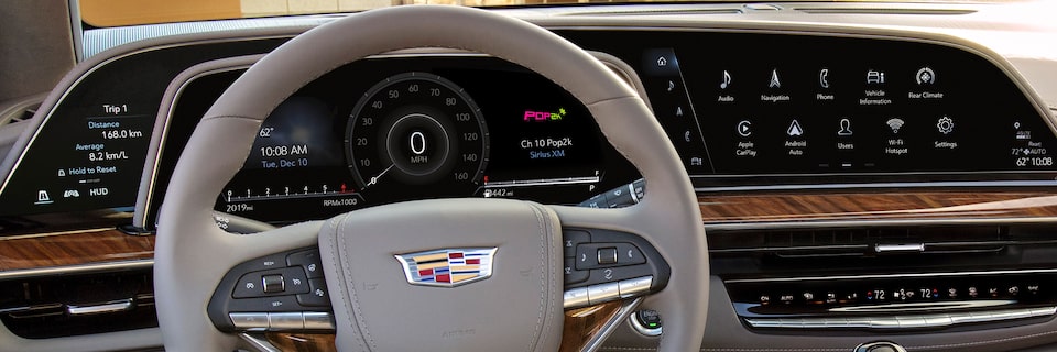 2023 Escalade front interior featuring the steering wheel.