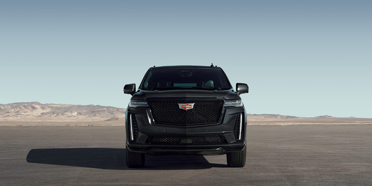 Stylishly Crafted Escalade V-Series in Front of Open Lot