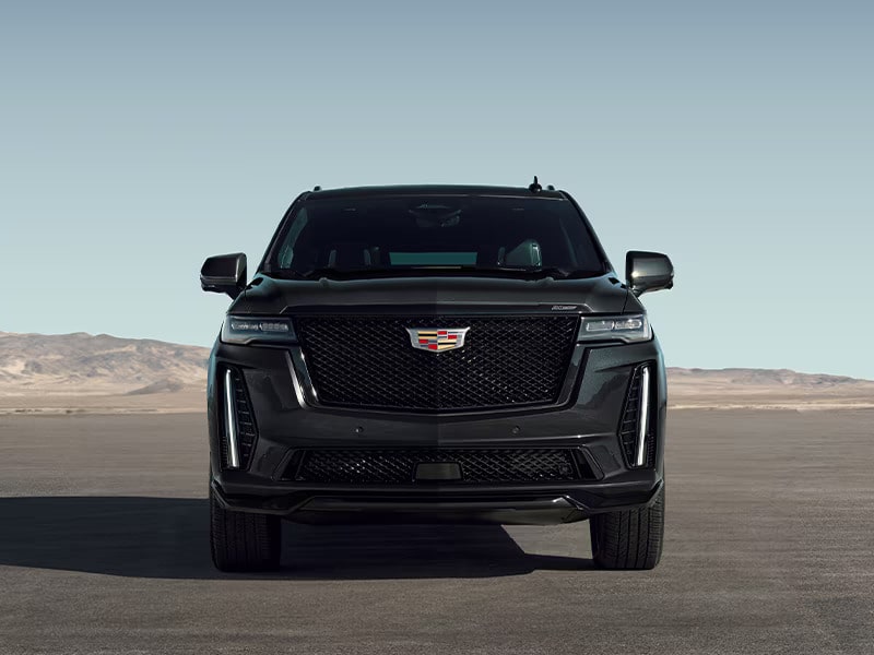 Stylishly Crafted Escalade V-Series in Front of Open Lot