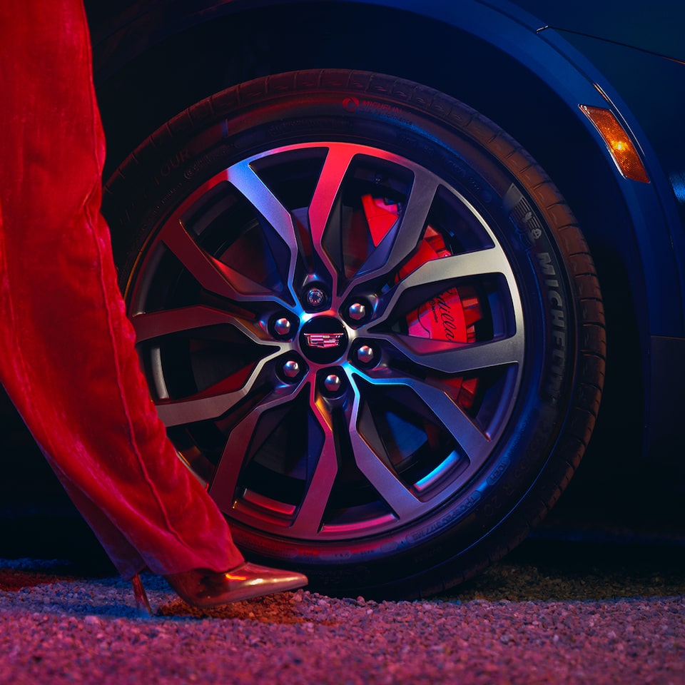Close up view of the alloy wheels on the 2026 Cadillac XT5 luxury SUV.