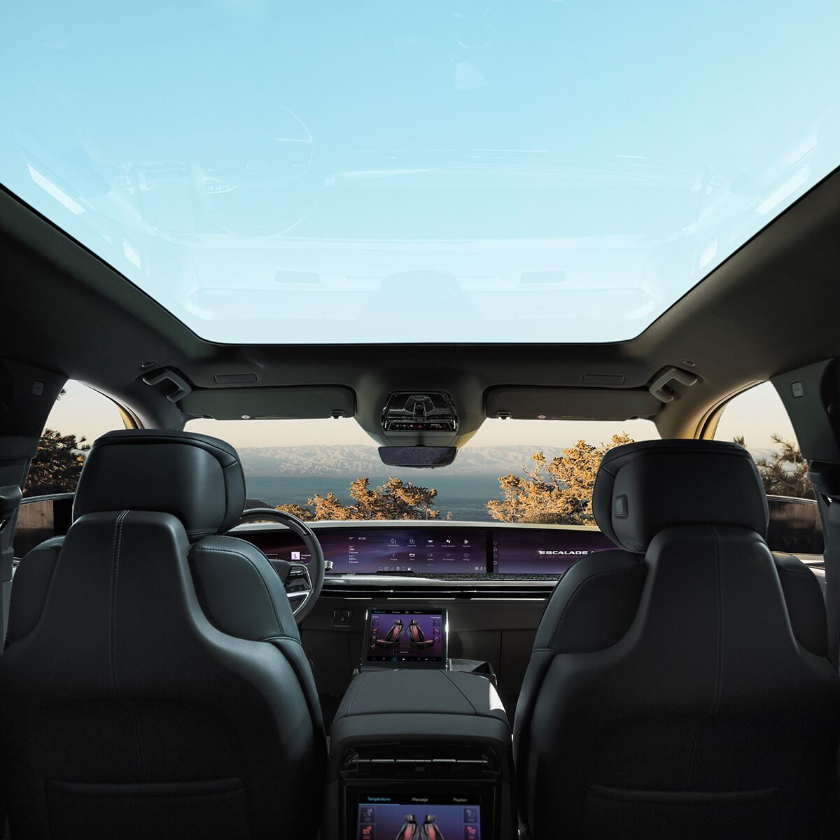 L’habitacle spacieux du Cadillac Escalade IQL 2026 vu par les passagers arrière.