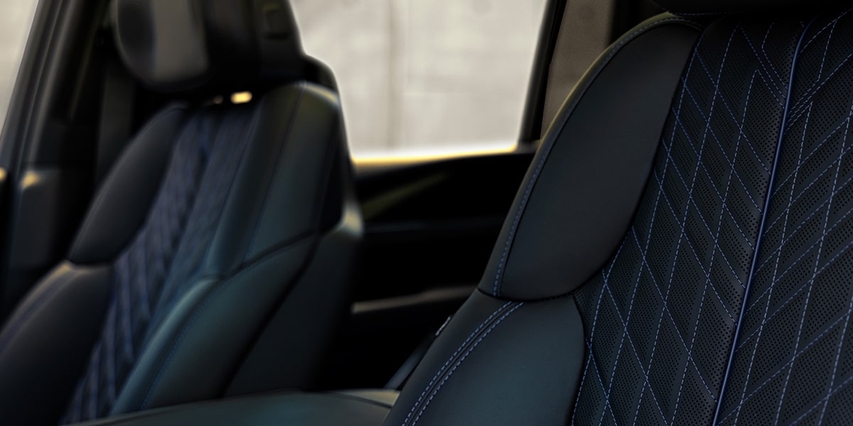 my26-escalade-iql-mov-gallery-staggered-interior-seats.jpg