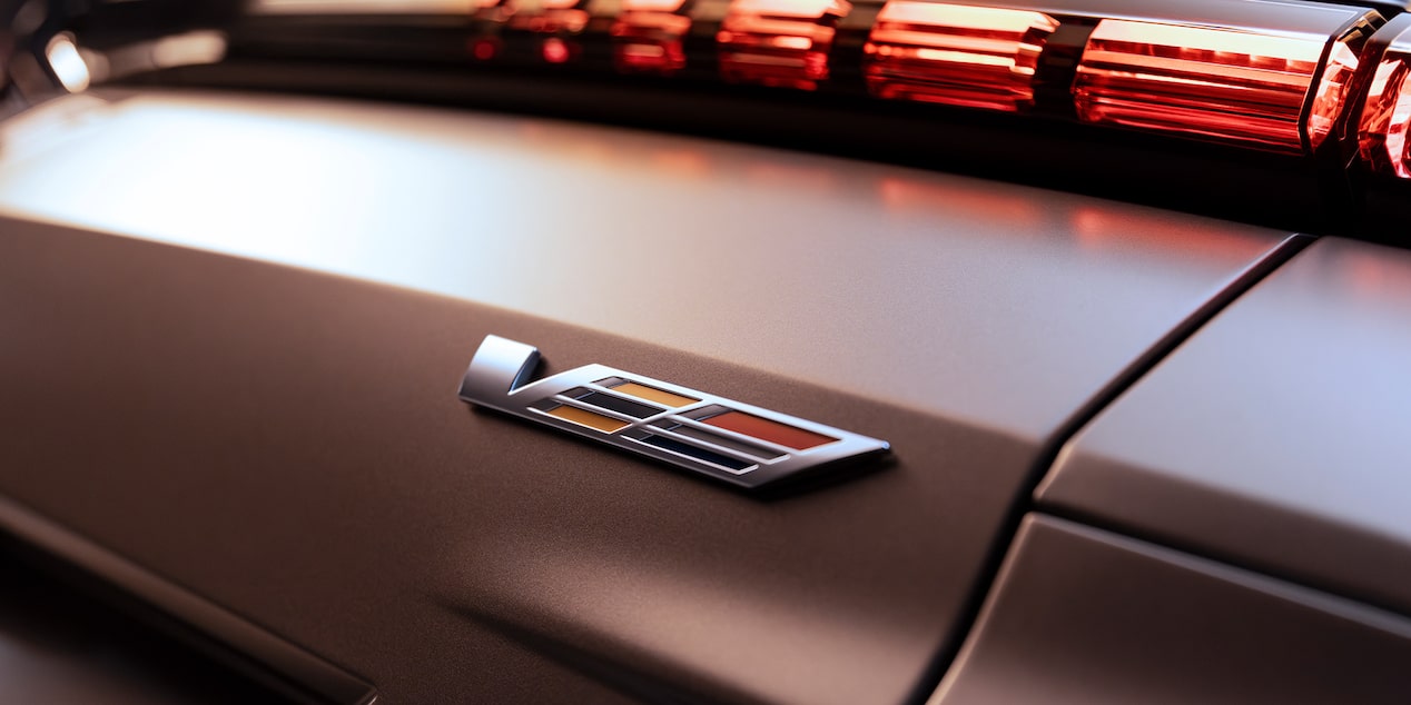 Close up view of the V logo etched on the exterior of the 2026 Cadillac LYRIQ-V.