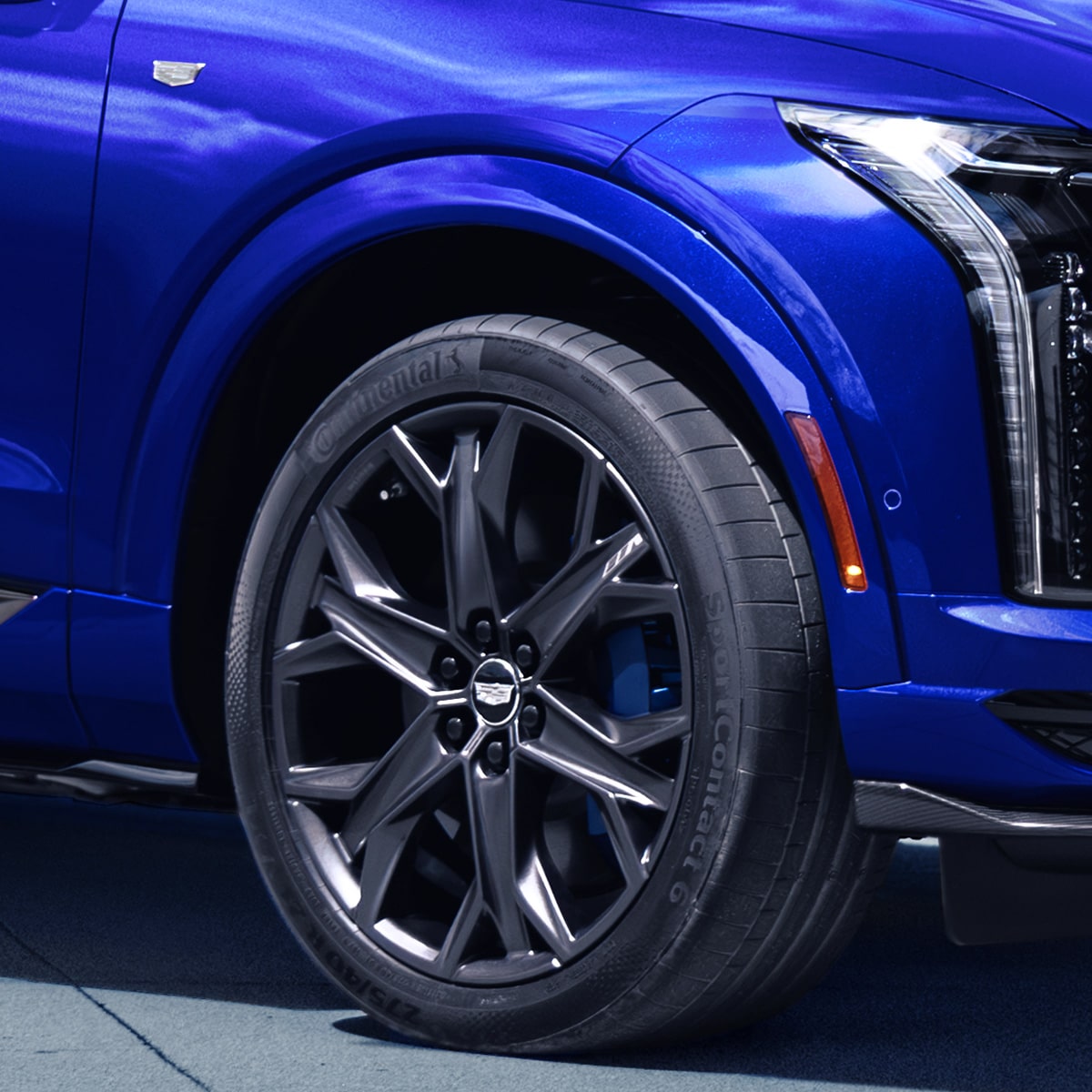 Front wheel and tire featuring performance alloy rims.