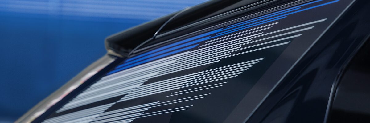 V-Series door sill plate with etched branding and carbon fiber trim.