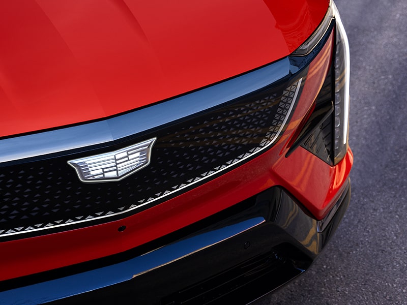 Cadillac insignia on the grille of the 2026 OPTIQ.