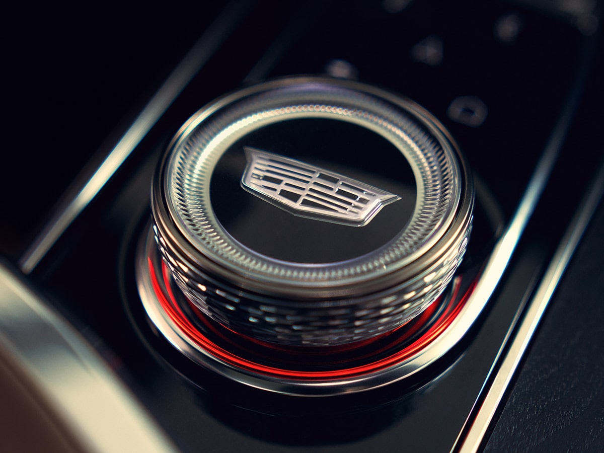 Close-up view of the 2027 Cadillac LYRIQ rotary controller located on the center console.