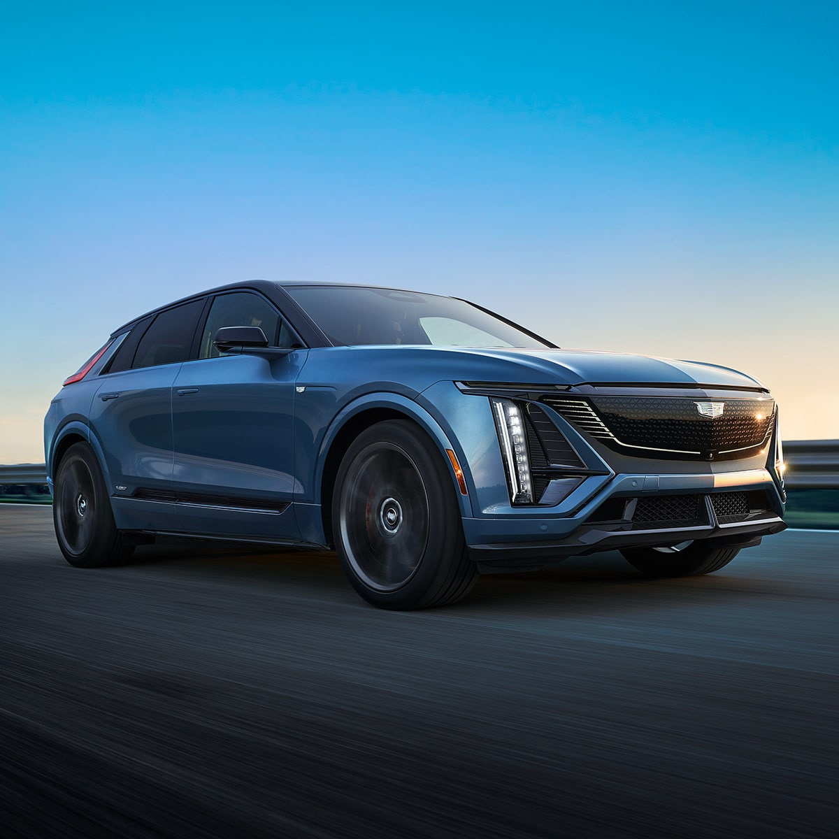 Front-side view of the 2027 Cadillac LYRIQ parked alone outdoors.