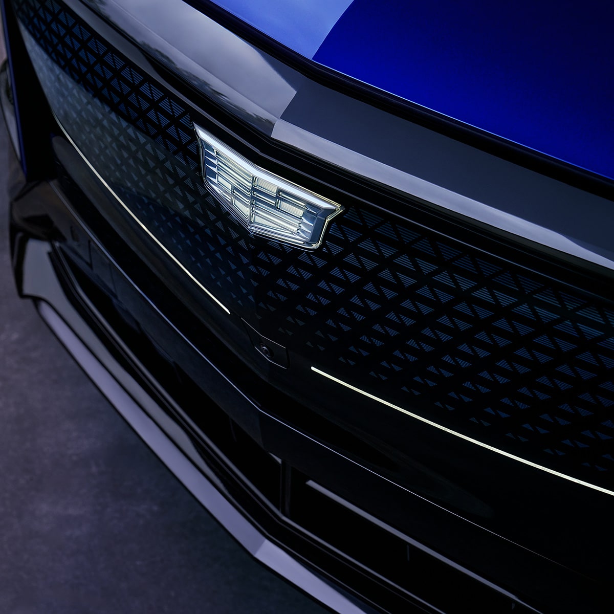 Close-up view of the Cadillac badge on the exterior of the 2027 Cadillac LYRIQ.