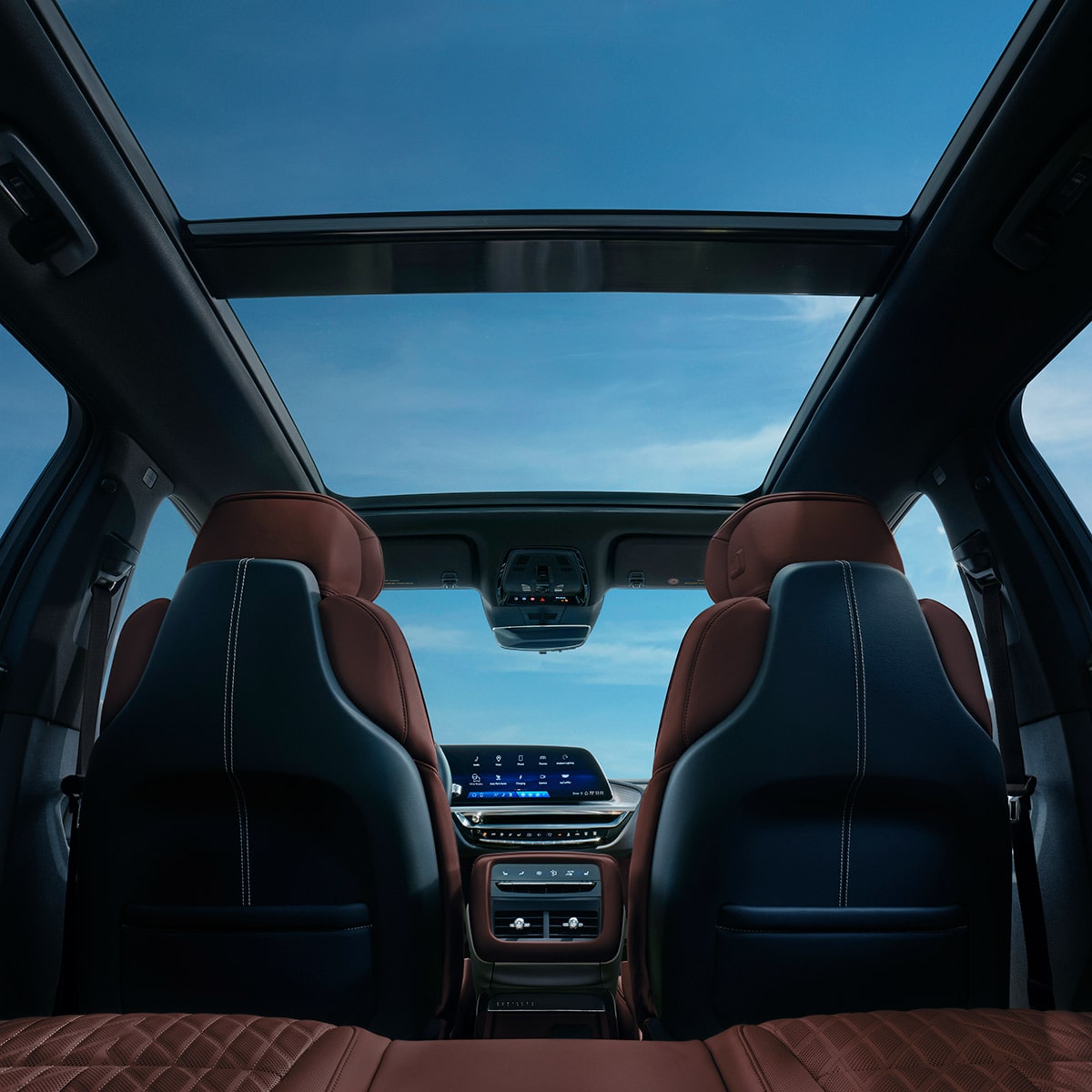 2027 Cadillac LYRIQ-V Interior With a Panoramic Glass Roof and Rear Seating View.