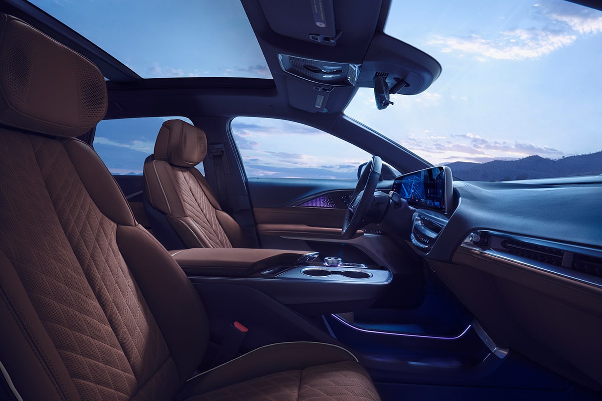 2027 Cadillac LYRIQ Interior With Brown Leather Seating and a Panoramic Glass Roof.