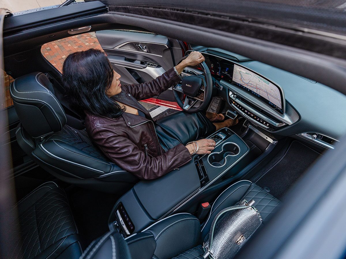 Front interiors of the 2027 Cadillac LYRIQ-V as viewed from the panoramic glass roof.