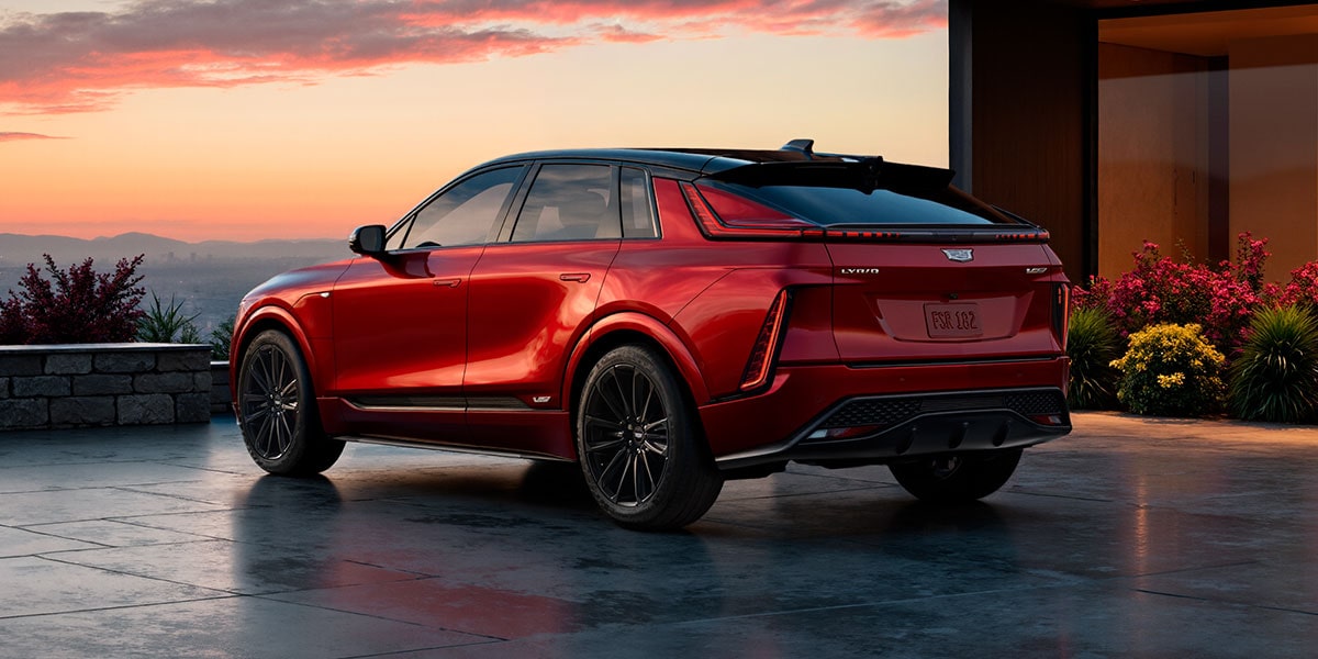 Back-side view of the 2027 Cadillac LYRIQ-V parked outside on a gloomy day.