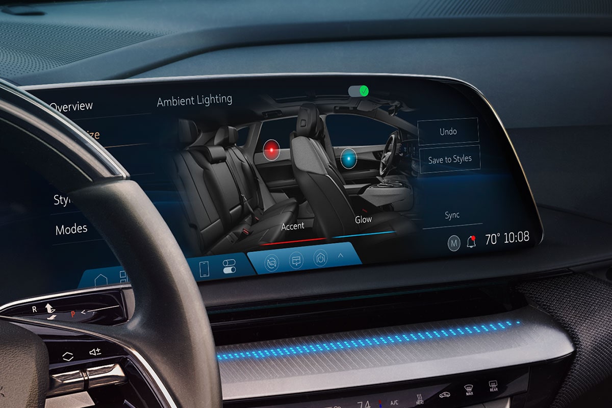 Close Up View of the Cadillac OPTIQ's Infotainment Screen Displaying Ambient Lighting