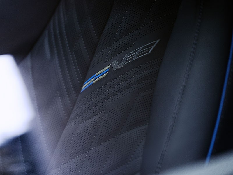 The V-Series Logo Stitched into the OPTIQ-V Seating