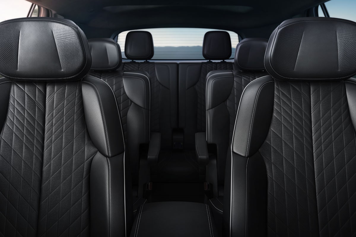 Dashboard View of the 2027 Cadillac VISTIQ's Three Rows of All-black Seating.
