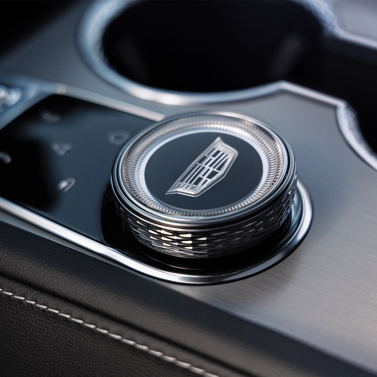 Gros plan sur le bouton VISTIQ ger 2027 situé dans la console centrale.