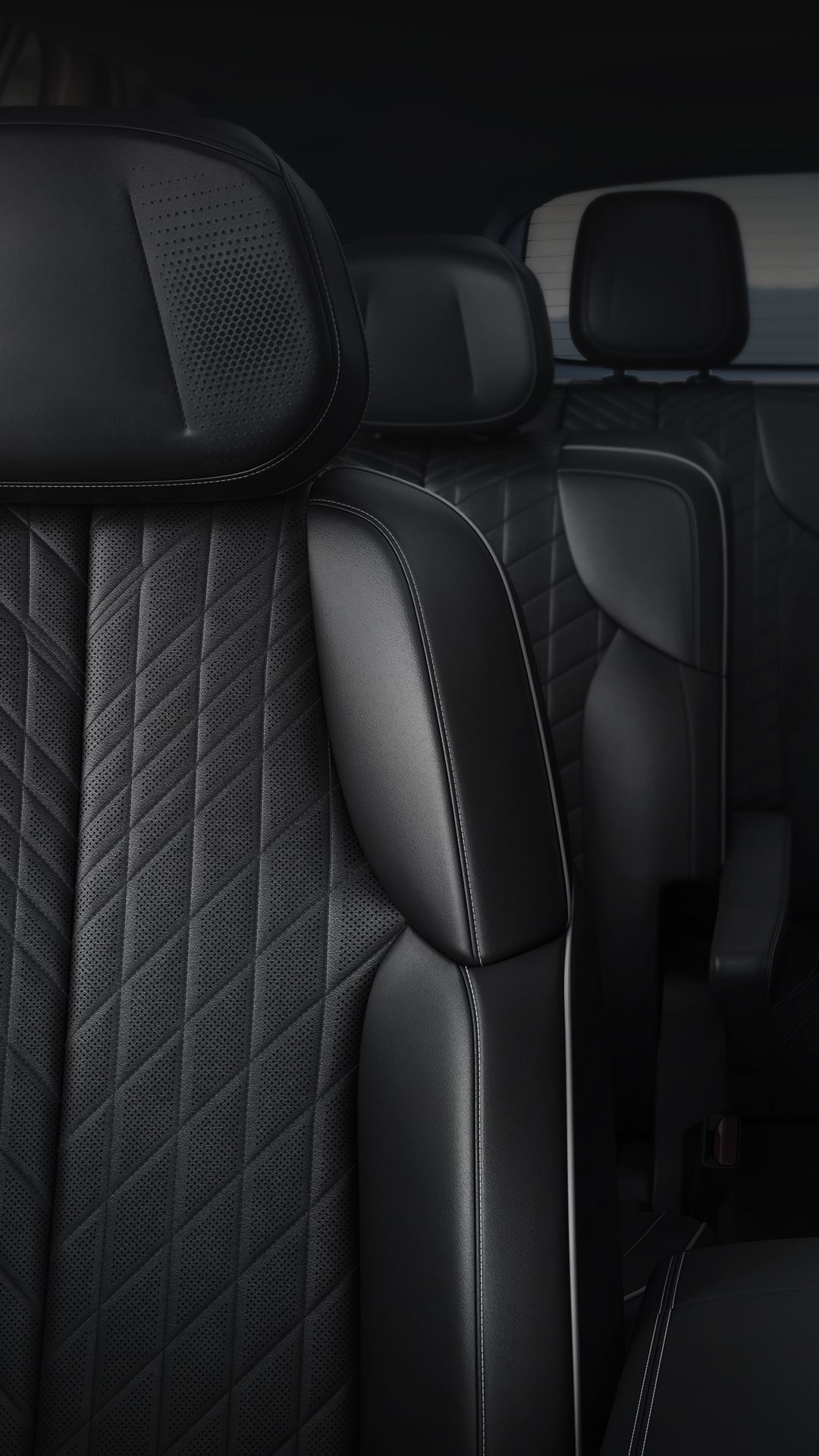 Interior View of the 2027 Cadillac VISTIQ's Three Rows of All-black Seating.