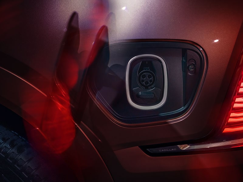 Close up view of the EV charging port on the 2026 Escalade IQ electric suv.