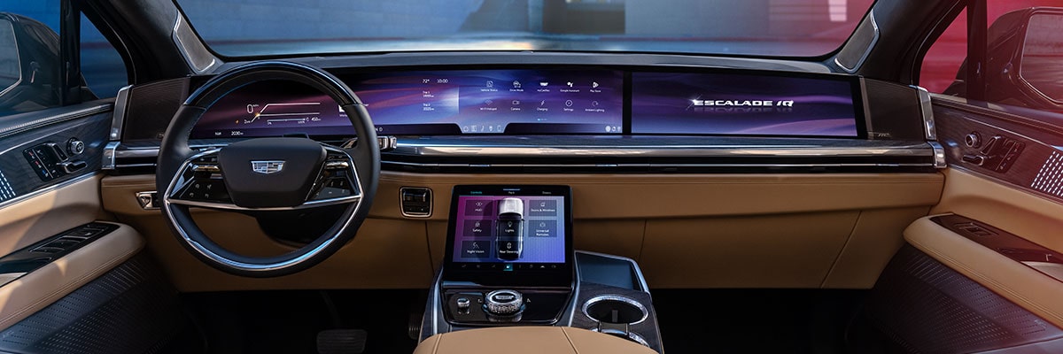 Wide view of the front interiors of the Cadillac Escalade IQ electric SUV.