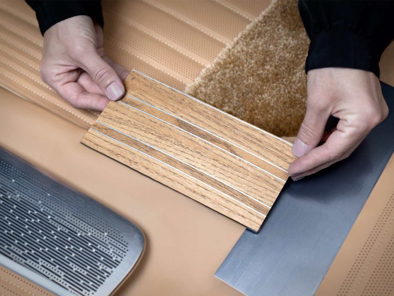 Saturn Open Pore Wood contrasted against the Cadillac CELESTIQ Vale design palette.