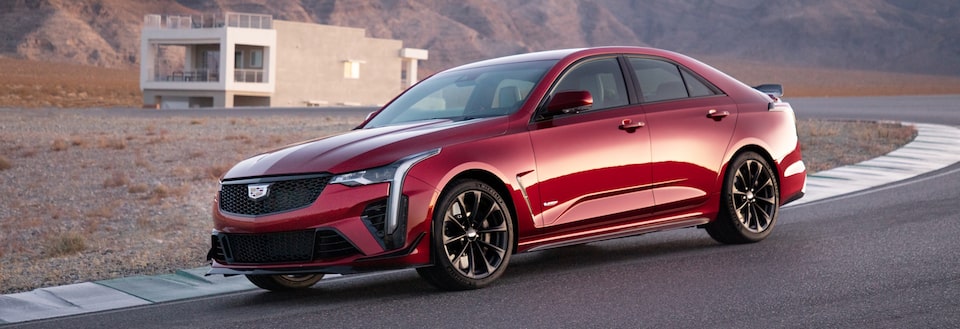 Front side view of the 2022 Cadillac CT4-V Blackwing parked on the road.